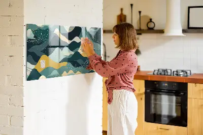 Magnetic wall board with illustrative mountains design