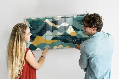 Magnetic wall board with illustrative mountains design