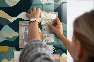 Magnetic wall board with illustrative mountains design