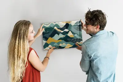 Magnetic wall board with illustrative mountains design