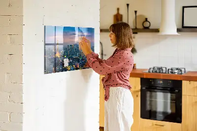 Magnetic glass dry erase board featuring a city at night