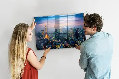 Magnetic glass dry erase board featuring a city at night