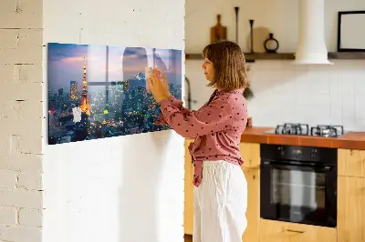 Magnetic glass dry erase board featuring a city at night