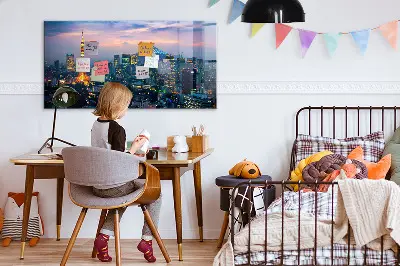 Magnetic glass dry erase board featuring a city at night