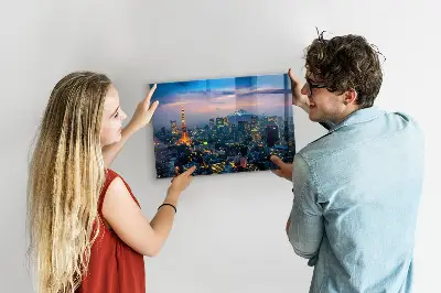 Magnetic glass dry erase board featuring a city at night