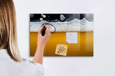 Magnetic writing board Close-up of beer