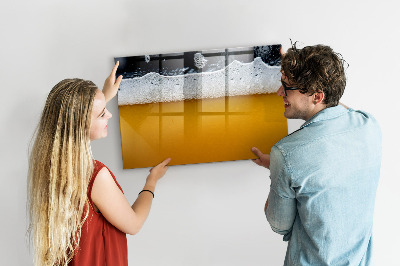 Magnetic writing board Close-up of beer