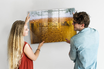 Magnetic writing board with marker A mug of beer