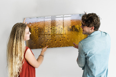Magnetic writing board with marker A mug of beer