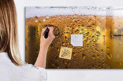 Magnetic writing board with marker A mug of beer