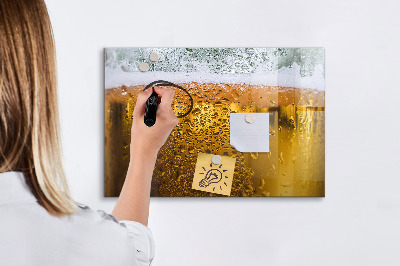 Magnetic writing board with marker A mug of beer