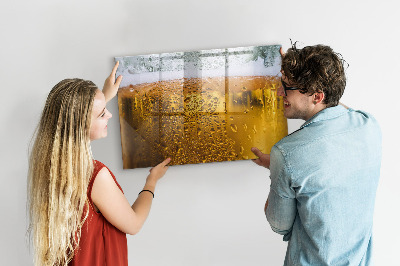 Magnetic writing board with marker A mug of beer