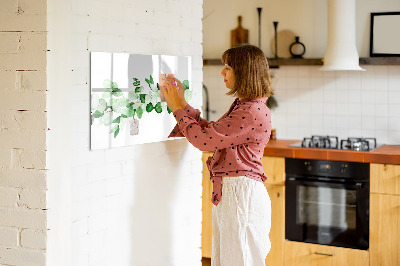 Magnetic erase board A branch of a plant