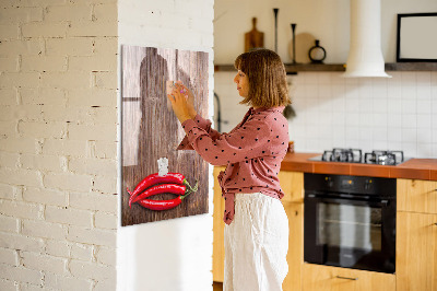 Magnetic board for drawing drawing Pepper on board